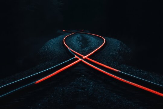 Long exposure train tracks at night with light trails