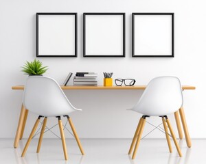 Three blank frames hang above a minimalist wooden desk with two white chairs and small potted plant, books and stationery. Clean lines and bright