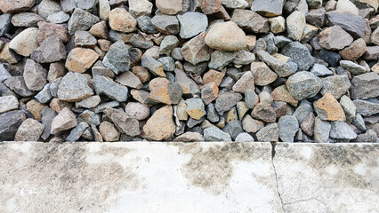 Close up of rough stones arranged randomly in the background. background concept.