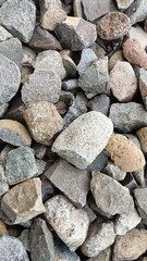 Close up of rough stones arranged randomly in the background. background concept.