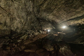Ancient underground cave gruta de san pedro in atocha bolivia with beautiful stone shapes, stalactites and groundwater landscape
