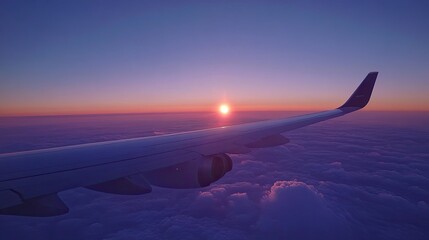 Obraz premium Airplane Wing Sunset Cloudscape Aerial View