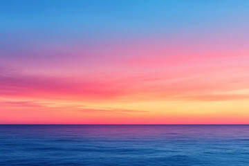 Obraz premium Sunset gradient fading into dusk, serene horizon line over calm waters