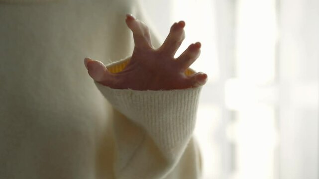 The girl shows her sharp and long nails on her hands.
The girl shows the gesture of a predator.
A predator with a long manicure.
A girl's long manicure.
Hand with nails close-up