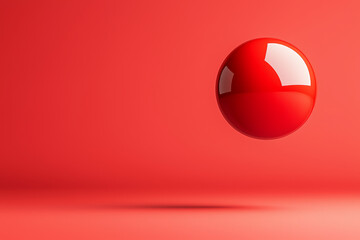 Red sphere hovers, casting shadow, simple form expressing quiet balance