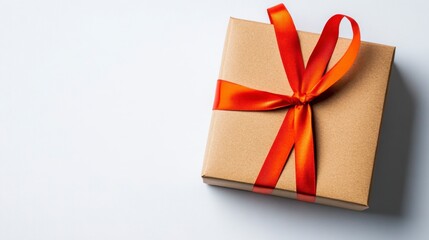 Square Brown Gift Box with Red Ribbon on White Background