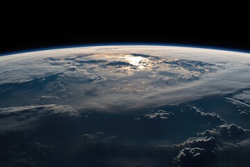 Fototapeta premium Earth Sunrise Viewed From Space Showing Clouds and Atmosphere