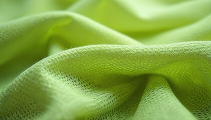 Close-up shot of lightweight breathable lime green polyester mesh fabric. Honeycomblike pattern with slight stretch, wrinkled texture for sportswear lining. Ideal for background, banner demo projects.