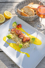 scallops on pistachio risotto, romanesco and saffron sauce