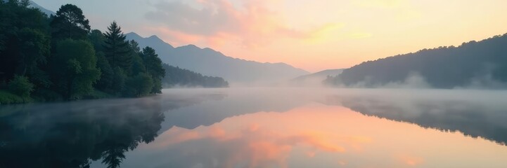 Obraz premium Softly glowing mist rises from a serene lake at dawn, natural, peaceful