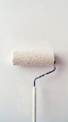 Obraz premium White Paint Roller on Textured Wall