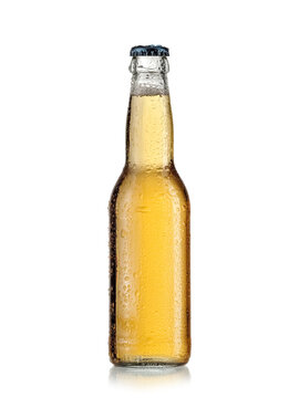 Small cider bottle with drops on white background, studio shot