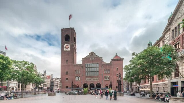 Hyperlapse of Beursplein with the historic Beurs van Berlage building, a former commodity exchange, now a venue for concerts and exhibitions. People walking across the square. Amsterdam, Netherlands