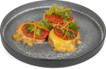 A closeup of a beautifully arranged plate of food on a table