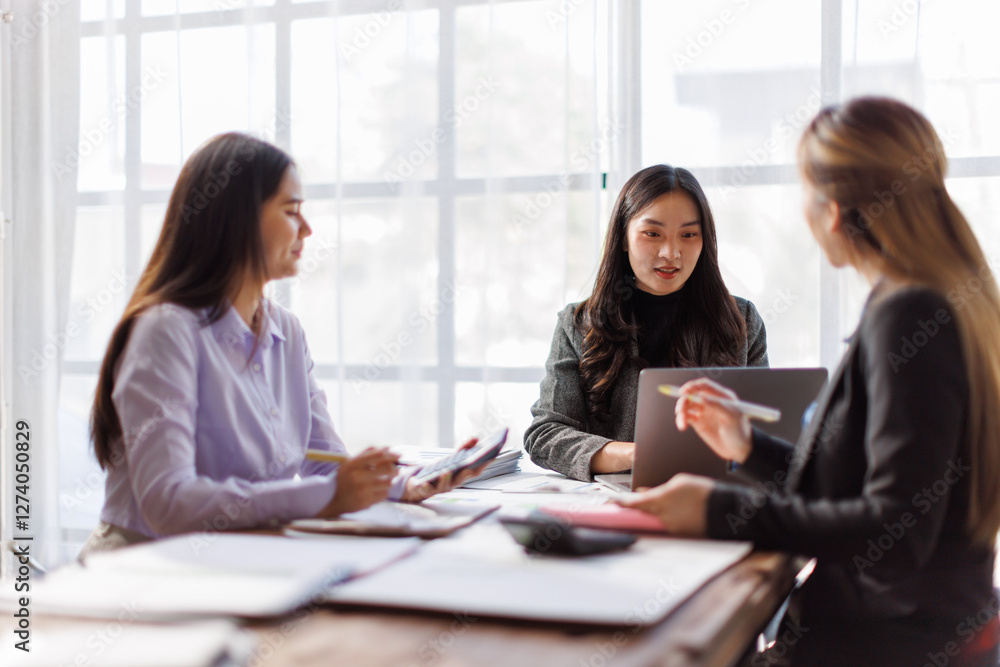 Wall mural Business adviser meeting to analyze and discuss the situation on the financial report in the Asian meeting room.Investment Consultant, Financial advisor and accounting concept
