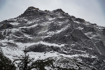 Majestic mountain peak alpine region nature photography snowy terrain aerial view serene wilderness