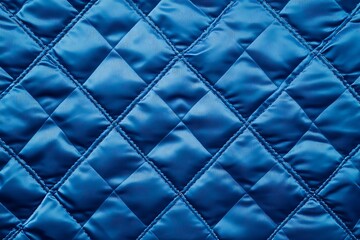 Fototapeta premium Dark blue colored seamless natural cotton linen textile fabric texture pattern, with diamond quilted, rhombic stiching. stitched background square