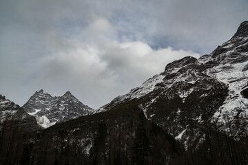 Winter adventure in the snow-capped mountains stunning landscape photography outdoor exploration dramatic viewpoint