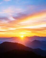 Fototapeta premium A golden-hour sky filled with vibrant orange, pink, and purple hues as the sun begins to set.
