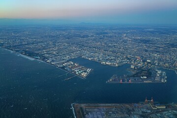 Aerial view of the Tokyo Bay, Japan, at nightfall in approach at Haneda Airport