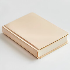 Fototapeta premium Elegant hardcover book with a light beige cover and gilt edges, capturing a blend of simplicity and sophistication.