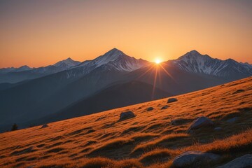 Naklejka premium mountains in the distance with a sun setting in the sky