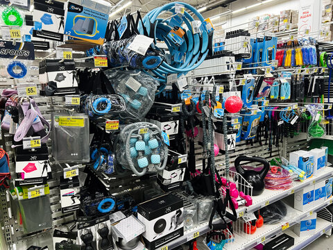 Lviv, Ukraine - February 16, 2025: Various fitness equipment products displayed on a retail store shelf for sale
