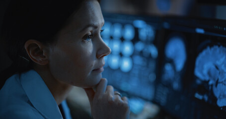 Medical Hospital Research Lab: Close Up of Female Medical Scientist Using Computer with Brain Scan...
