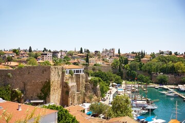 Obraz premium Antalya Old Town with Historic Walls, Marina, and Mediterranean View 