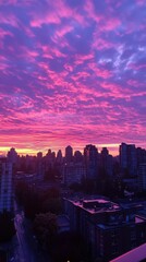 Fototapeta premium Vibrant Pink Sunset over Vancouver Skyline
