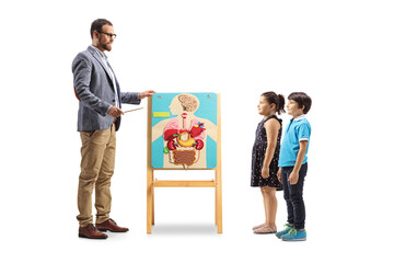 Man giving a lecutre to children about human organs