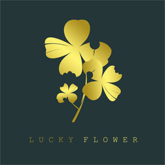 several pairs of gold-colored lucky flowers