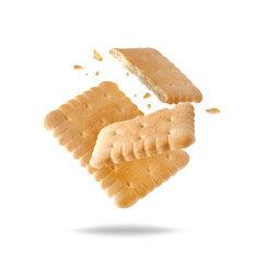 Whole and crushed crispy cookies in the air close-up on a white background