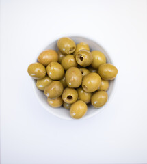 three green olives isolated on white
