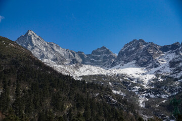 Majestic snow-capped mountains himalayas nature landscape clear sky wide angle adventure awaits