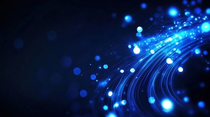 An abstract background featuring elegant blue light trails and glowing bokeh effects, perfect for technology and digital themes, conveying a sense of motion and innovation.