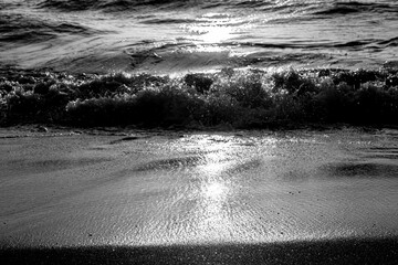 Salt in the air, sand in my hair, and the warmth of the setting sun in my soul each wave sings a...