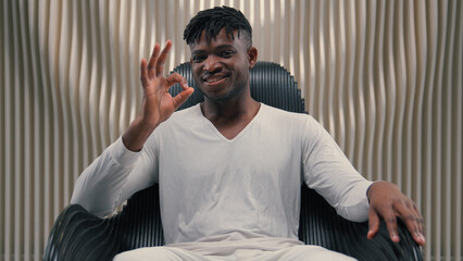Futurism African American ethnic man male guy in white futuristic room indoors cyberspace modern...