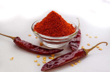 Aloe gel dropping from fresh cut of aloe vera leaf , macro shot on white background. Selective focus.
