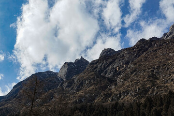 Mountain climbing adventure rocky peaks nature photography alpine environment dramatic viewpoint outdoor exploration