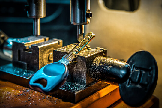 Professional key duplicate machine makes new key copy. Locksmith theme