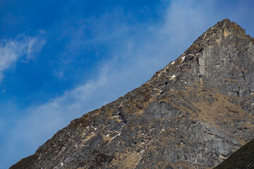 Mountain climbing adventure high altitude summit nature photography rocky terrain scenic view...