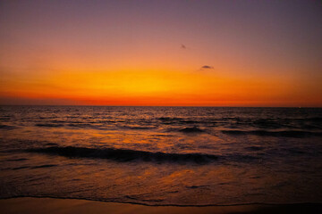 Salt in the air, sand in my hair, and the warmth of the setting sun in my soul each wave sings a...