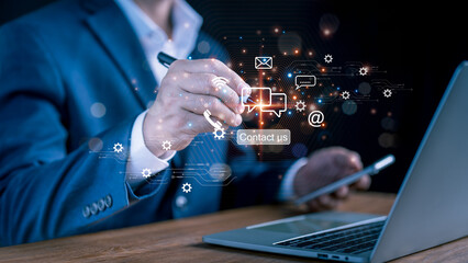 A man points to an operator's logo, which features after-sales service imagery. Channel of communication for customer satisfaction