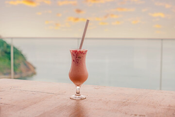 close-up of a delicious fruit cocktail on a roof top