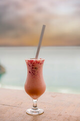 close-up of a delicious fruit cocktail on a roof top