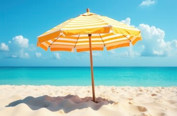 Vibrant yellow beach umbrella on sandy shore under clear blue sky