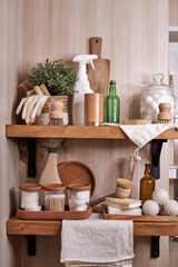 wooden shelf with accessories and cleaning products for washing, eco-friendly cleaning