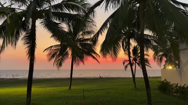 Experience a breathtaking aerial journey over a pristine tropical beach. The camera gracefully pulls back to reveal a captivating scene featuring a long wooden boardwalk, soft white sands, and charmin