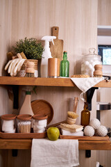 wooden shelf with accessories and cleaning products for washing, eco-friendly cleaning